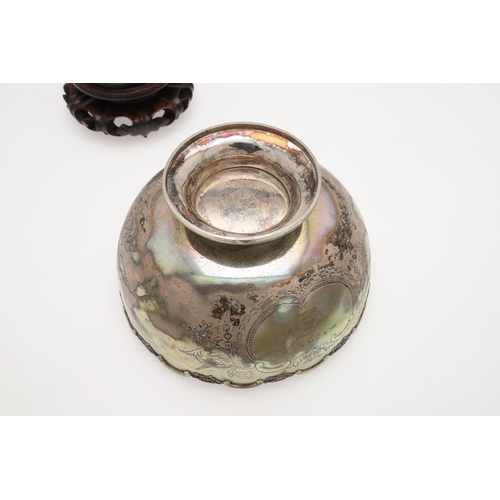 217 - A LATE 19TH/ EARLY 20TH CENTURY CHINESE SILVER ROSE BOWL. of circular outline, with a border of alte... 