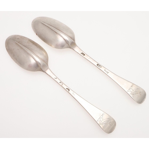 23 - A PAIR OF GEORGE I HANOVERIAN PATTERN SILVER TABLE SPOONS. with a moulded rattail, crested on the ba... 