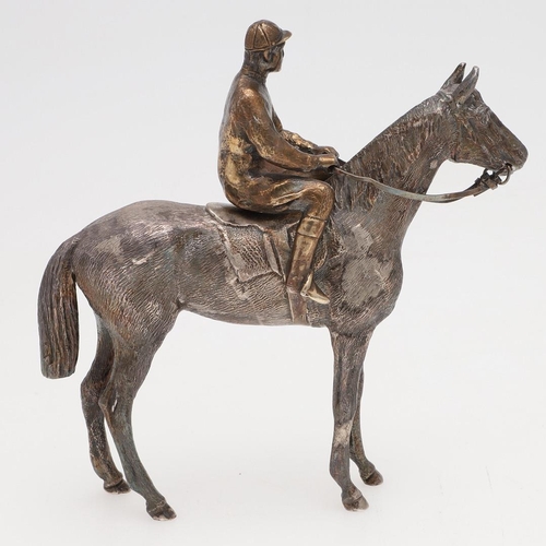 234 - A MODERN CAST SILVER FIGURE OF A RACEHORSE & JOCKEY. the jockey seated & holding reins, by SMD Casti... 