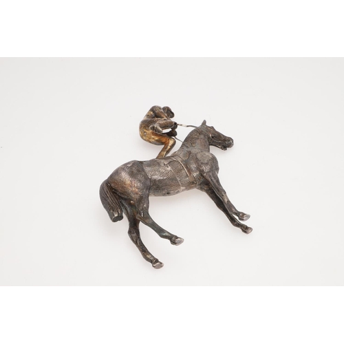 234 - A MODERN CAST SILVER FIGURE OF A RACEHORSE & JOCKEY. the jockey seated & holding reins, by SMD Casti... 