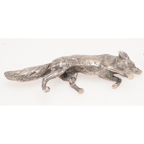 235 - A MODERN SILVER FIGURE OF A RUNNING FOX. makers mark partially lost in decoration, London 1963, toge... 