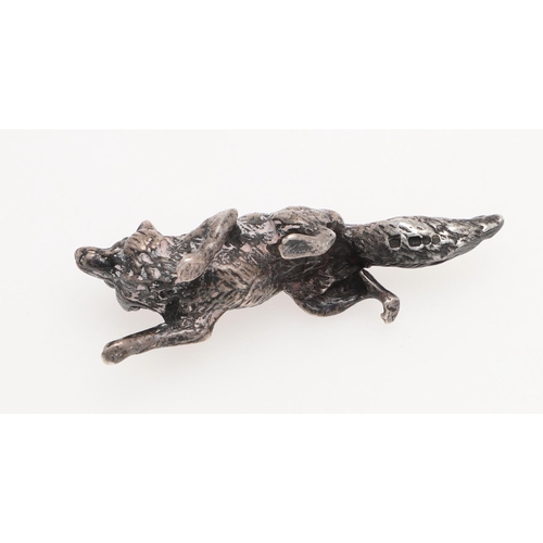 235 - A MODERN SILVER FIGURE OF A RUNNING FOX. makers mark partially lost in decoration, London 1963, toge... 