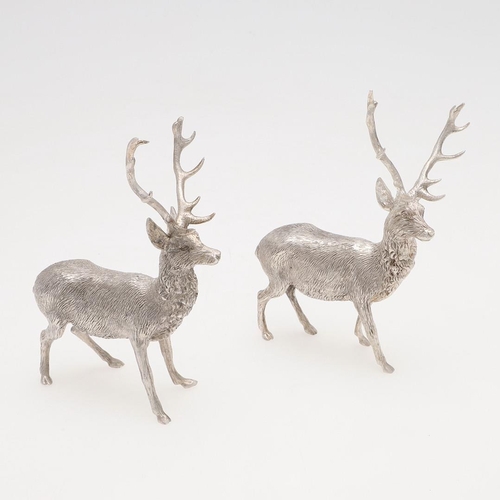 237 - A PAIR OF CONTEMPORARY SILVER FIGURES OF STANDING STAGS. makers mark 