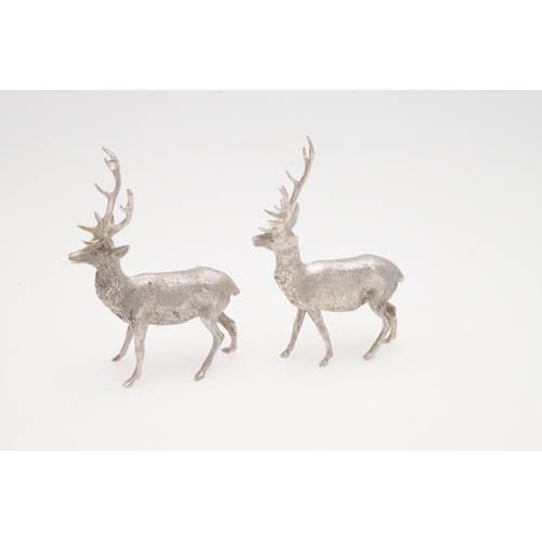 237 - A PAIR OF CONTEMPORARY SILVER FIGURES OF STANDING STAGS. makers mark 