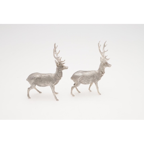 237 - A PAIR OF CONTEMPORARY SILVER FIGURES OF STANDING STAGS. makers mark 