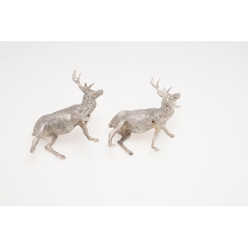 237 - A PAIR OF CONTEMPORARY SILVER FIGURES OF STANDING STAGS. makers mark 