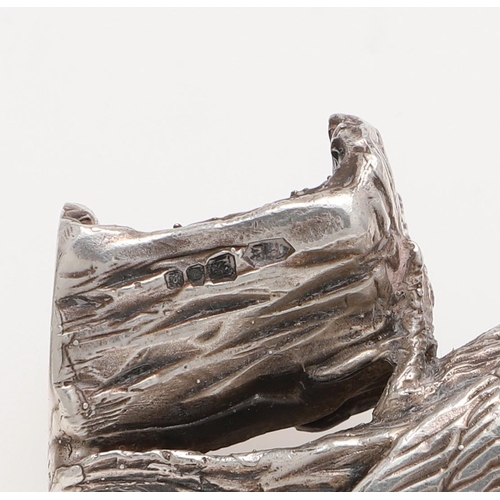 239 - A PAIR OF MODERN SILVER FIGURES OF WOODPECKERS. perched on tree stumps, by Paul Eaton, London 1990; ... 