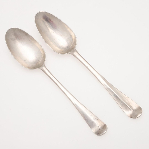 24 - TWO 18TH CENTURY HANOVERIAN PATTERN IRISH SILVER TABLE SPOONS. one crested on the back of the termin... 