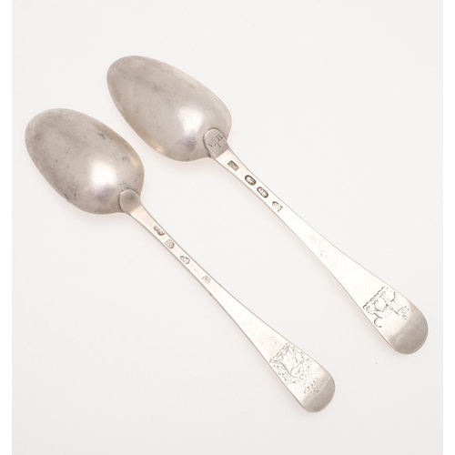 24 - TWO 18TH CENTURY HANOVERIAN PATTERN IRISH SILVER TABLE SPOONS. one crested on the back of the termin... 