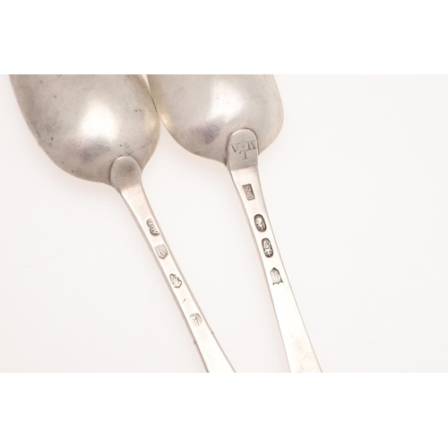 24 - TWO 18TH CENTURY HANOVERIAN PATTERN IRISH SILVER TABLE SPOONS. one crested on the back of the termin... 