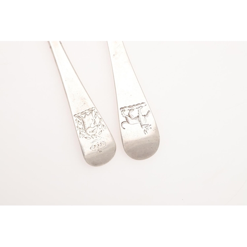 24 - TWO 18TH CENTURY HANOVERIAN PATTERN IRISH SILVER TABLE SPOONS. one crested on the back of the termin... 