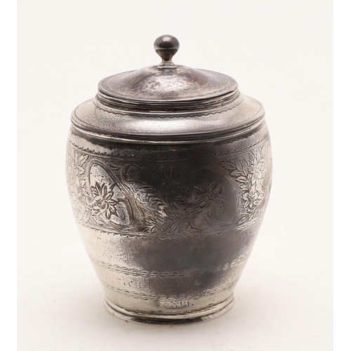 241 - A GEORGE III SILVER TEA CADDY. circular form, with engraved decoration and the pull-off cover with a... 