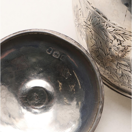 241 - A GEORGE III SILVER TEA CADDY. circular form, with engraved decoration and the pull-off cover with a... 