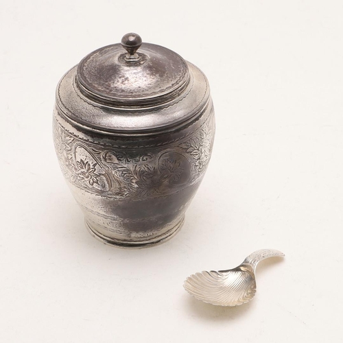 241 - A GEORGE III SILVER TEA CADDY. circular form, with engraved decoration and the pull-off cover with a... 