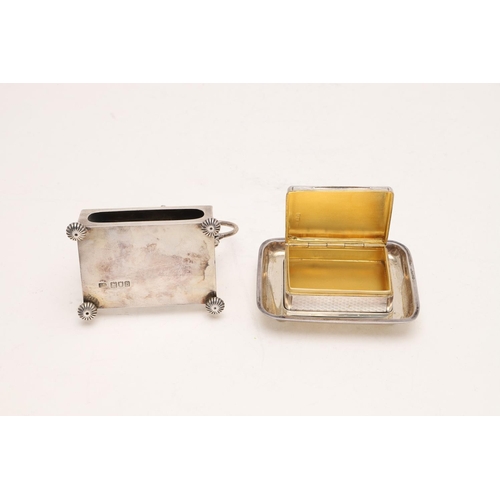 244 - A GEORGE V RECTANGULAR SILVER VESTA BOX & MATCHING STAND. with engine-turned decoration, a gilt inte... 