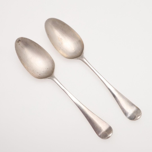 25 - A PAIR OF GEORGE III HANOVERIAN PATTERN SILVER TABLE SPOONS. crested on the back of their terminals,... 