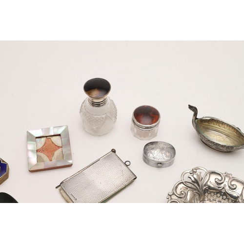 254 - A MIXED LOT. including 7 mother-of-pearl implements, a pickle fork & condiment spoon with mother-of-... 