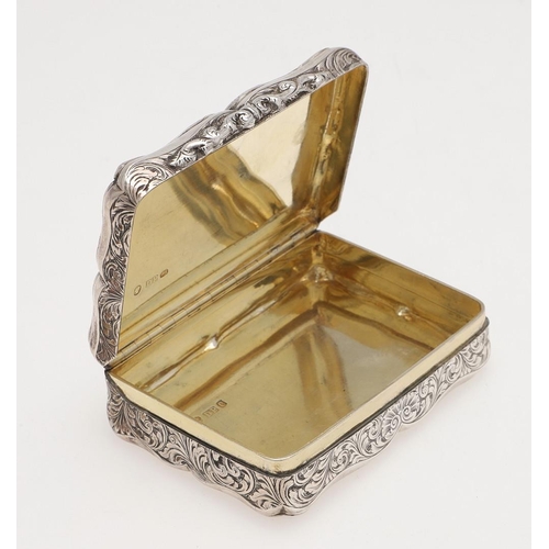 260 - A VICTORIAN SILVER SNUFF BOX. shaped rectangular, with engraved decoration on the body and the thumb... 