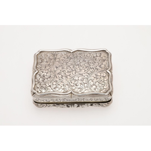 260 - A VICTORIAN SILVER SNUFF BOX. shaped rectangular, with engraved decoration on the body and the thumb... 