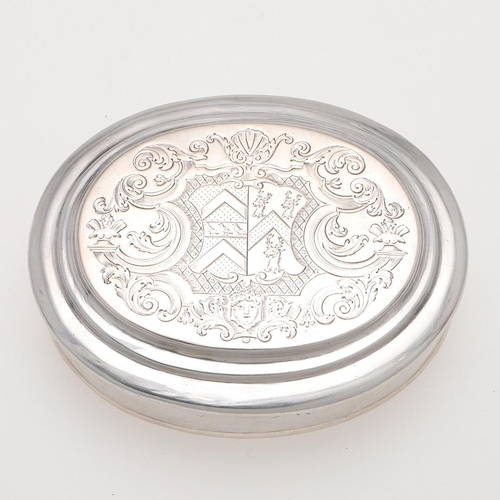 264 - A GEORGE II OVAL SILVER TOBACCO BOX. with plain moulded borders, engraved on the cover with a large ... 