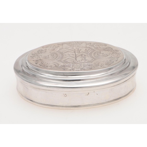 264 - A GEORGE II OVAL SILVER TOBACCO BOX. with plain moulded borders, engraved on the cover with a large ... 