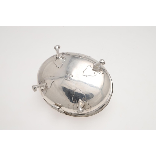 265 - A WWII PERIOD SILVER SUGAR BOX. in the style of a Charles I example, oval form, with applied decorat... 