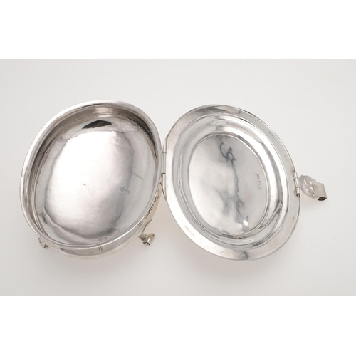 265 - A WWII PERIOD SILVER SUGAR BOX. in the style of a Charles I example, oval form, with applied decorat... 