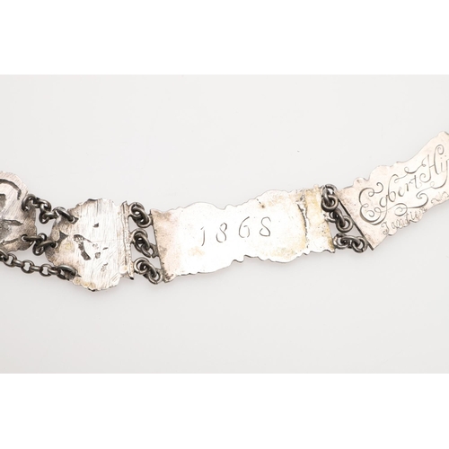 296 - A DUTCH SILVER BELT. with alternating panels decorated in relief with figures within scroll borders,... 