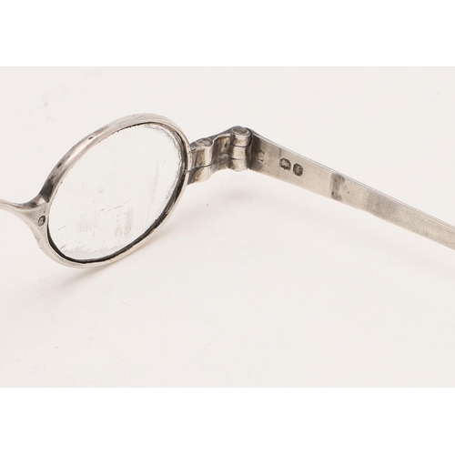 301 - A VICTORIAN PAIR OF FOLDING SILVER SPECTACLES. with double-hinged arms, no makers mark, London 1841;... 