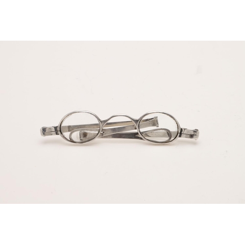 301 - A VICTORIAN PAIR OF FOLDING SILVER SPECTACLES. with double-hinged arms, no makers mark, London 1841;... 