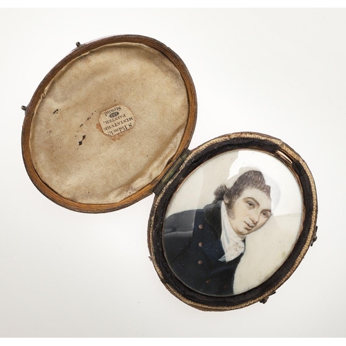 306 - ATTRIBUTED TO SOLOMON POLACK (1757-1839). Miniature portrait of a gentleman wearing dark blue jacket... 