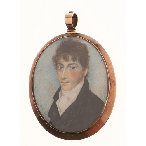 307 - ENGLISH SCHOOL. Miniature portrait of a young man wearing blue jacket and white stock on ivory, 5.5 ... 