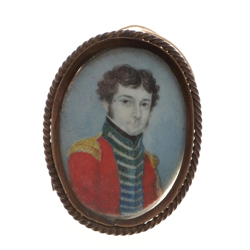 307 - ENGLISH SCHOOL. Miniature portrait of a young man wearing blue jacket and white stock on ivory, 5.5 ... 