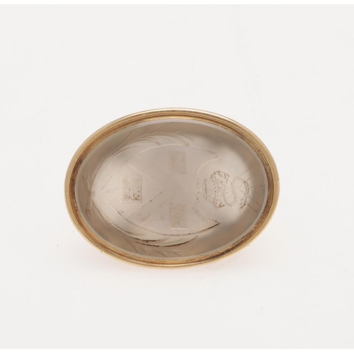 313 - A GEORGE III GOLD FOB SEAL. with a chalcedony matrix, engraved with a coat of arms; 1.3