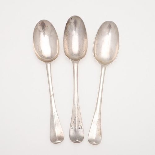 32 - THREE EARLY 18TH CENTURY HANOVERIAN PATTERN SILVER TABLE SPOONS. a near pair, with moulded rattails,... 