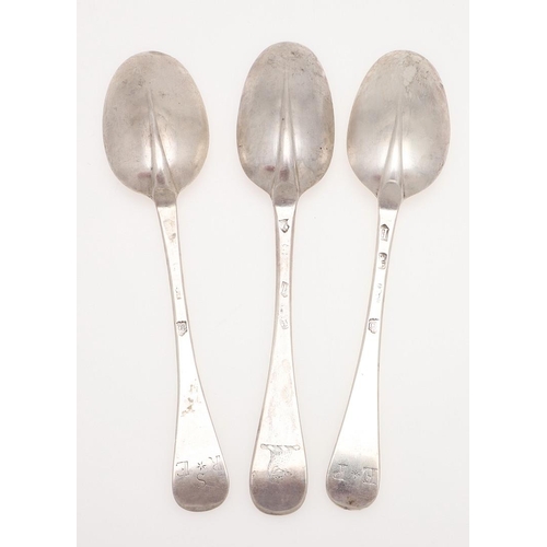 32 - THREE EARLY 18TH CENTURY HANOVERIAN PATTERN SILVER TABLE SPOONS. a near pair, with moulded rattails,... 