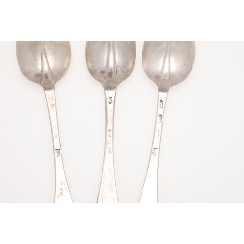 32 - THREE EARLY 18TH CENTURY HANOVERIAN PATTERN SILVER TABLE SPOONS. a near pair, with moulded rattails,... 