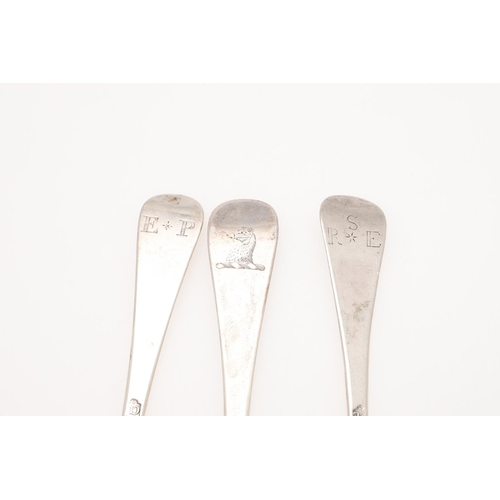 32 - THREE EARLY 18TH CENTURY HANOVERIAN PATTERN SILVER TABLE SPOONS. a near pair, with moulded rattails,... 