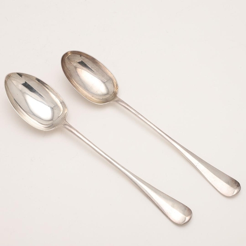 4 - A PAIR OF EDWARDIAN HANOVERIAN PATTERN SILVER BASTING SPOONS. with plain rattails, by Mappin & Webb,... 