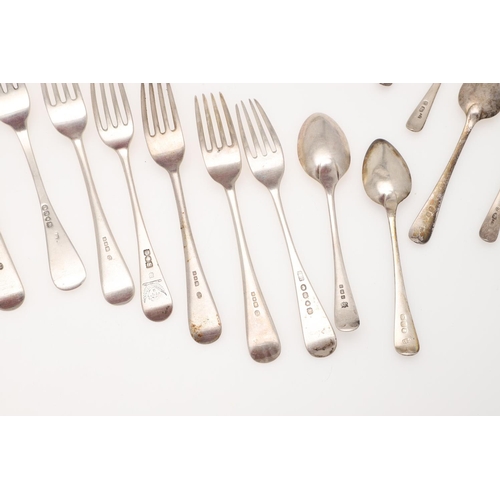 44 - A MIXED LOT OF SILVER FLATWARE. Old English pattern, including 12 table spoons, a table fork, 8 dess... 