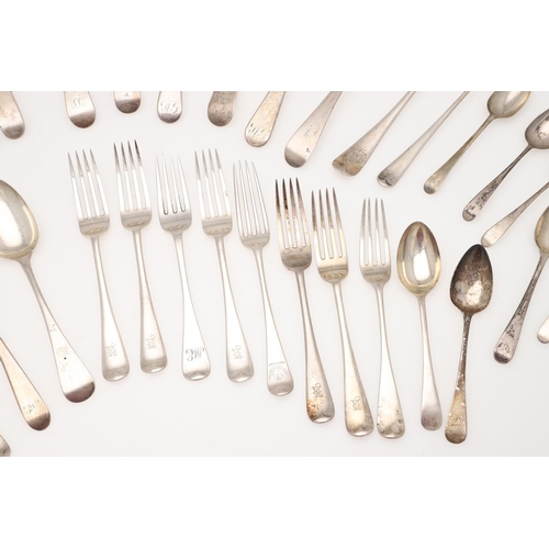 44 - A MIXED LOT OF SILVER FLATWARE. Old English pattern, including 12 table spoons, a table fork, 8 dess... 