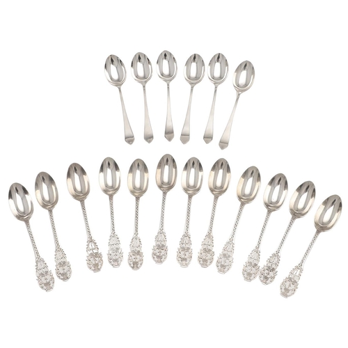 49 - TWO CASED SETS OF SILVER TEASPOONS. a set of twelve, with bright-cut stems and thistle terminals, by... 