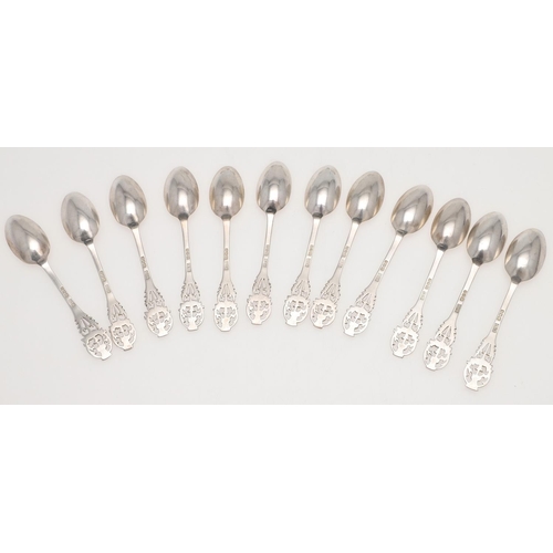 49 - TWO CASED SETS OF SILVER TEASPOONS. a set of twelve, with bright-cut stems and thistle terminals, by... 