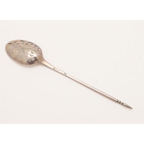 5 - A MID-18TH CENTURY SILVER MOTE SPOON. the bowl with pierced scrolls, drilled holes and a single drop... 