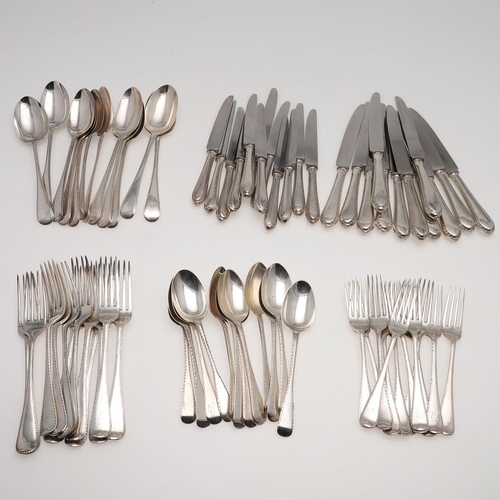 70 - A MATCHED OR HARLEQUIN PART-CANTEEN OF FEATHER-EDGE SILVER FLATWARE & CUTLERY. comprising of 12 tabl... 