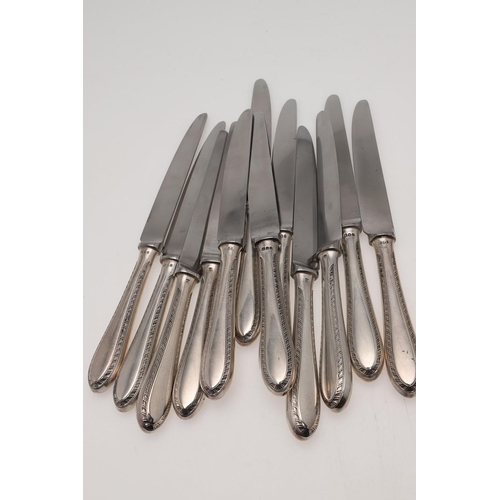 70 - A MATCHED OR HARLEQUIN PART-CANTEEN OF FEATHER-EDGE SILVER FLATWARE & CUTLERY. comprising of 12 tabl... 