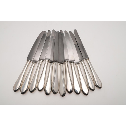 70 - A MATCHED OR HARLEQUIN PART-CANTEEN OF FEATHER-EDGE SILVER FLATWARE & CUTLERY. comprising of 12 tabl... 