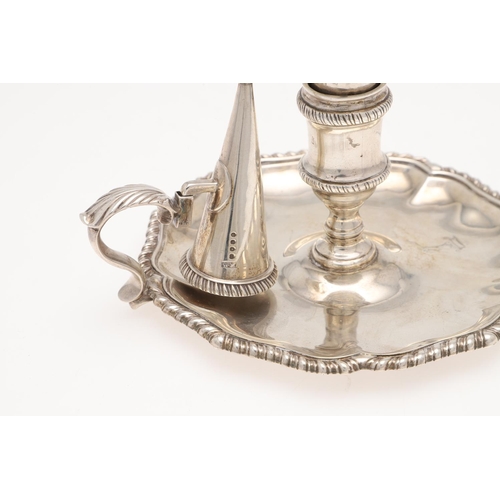 90 - A VICTORIAN SILVER CHAMBERSTICK. shaped circular outline, with gadrooned borders,  detachable nozzle... 