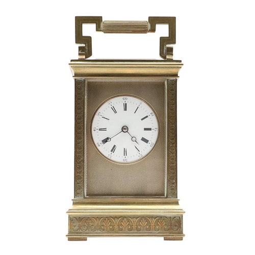 1139 - A LATE 19TH CENTURY BRASS CARRIAGE CLOCK. with enamel dial to an engine turned brass surround, the m... 