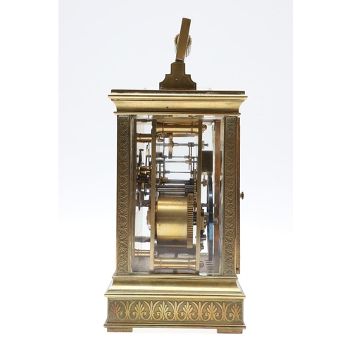 1139 - A LATE 19TH CENTURY BRASS CARRIAGE CLOCK. with enamel dial to an engine turned brass surround, the m... 